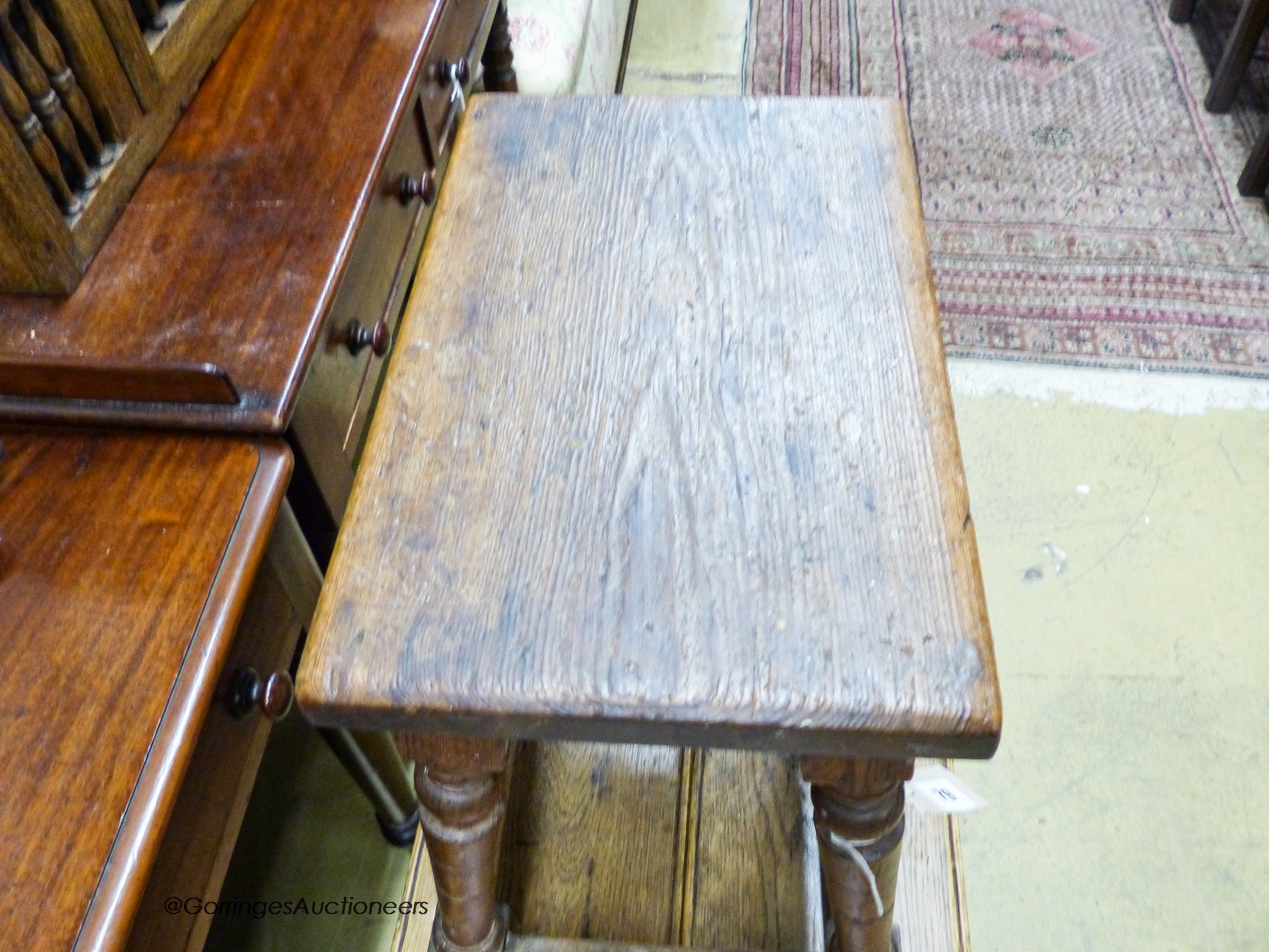 A pair of late 18th / early 19th century oak and elm benches, length 120cm, depth 22cm, height 43cm together with a pine joint stool